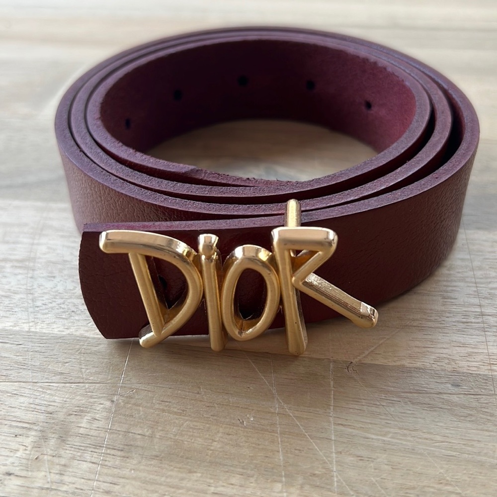 Cherry color gold buckled belt